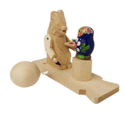 Богородская игрушка "Медведь-художник расписывает матрёшку"